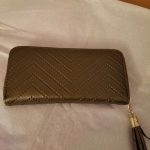 Wallet Gold tone embossed with tassel, nwot